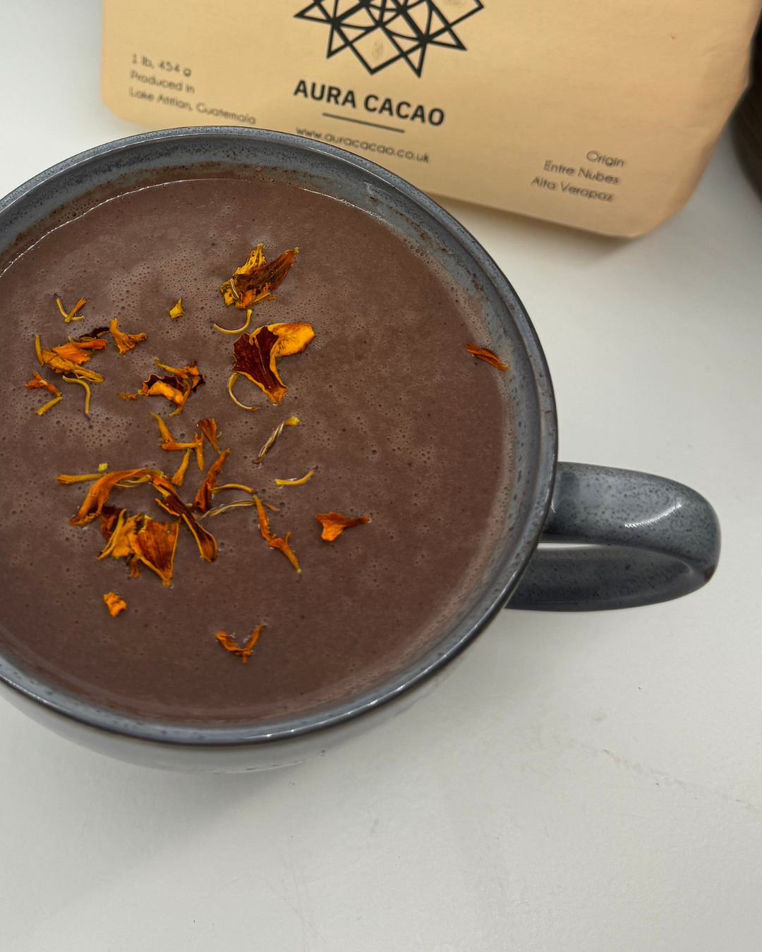 Close-up of stone-ground cacao pieces – ethically sourced and handcrafted